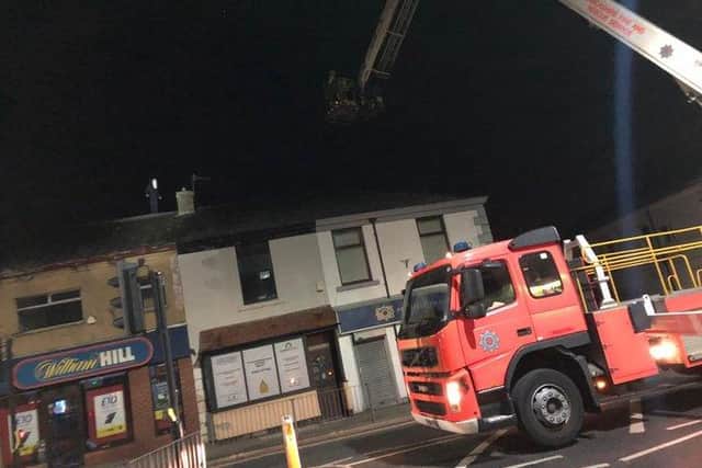The man was brought down by a fire service crane after a 13-hour stand-off with police (March 6). (Credit: Chris Archer - @SDM_Pendle)