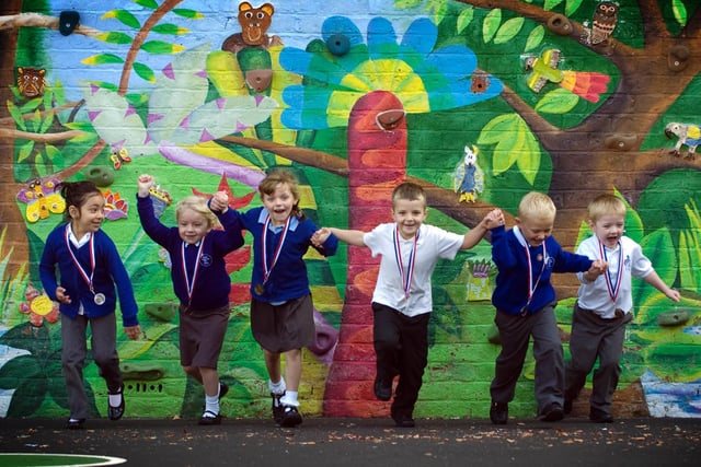 Eldon Primary reception class pupils, from left, Rabeeah Ibrahim, five, Nicole Ball, five, Alice Eden, five, Bradley Ellis, five, Arron Kirkby, four and Jaron Skidmore, four, who won medals during the mini Olympics held by the school at Cottam Sports Arena