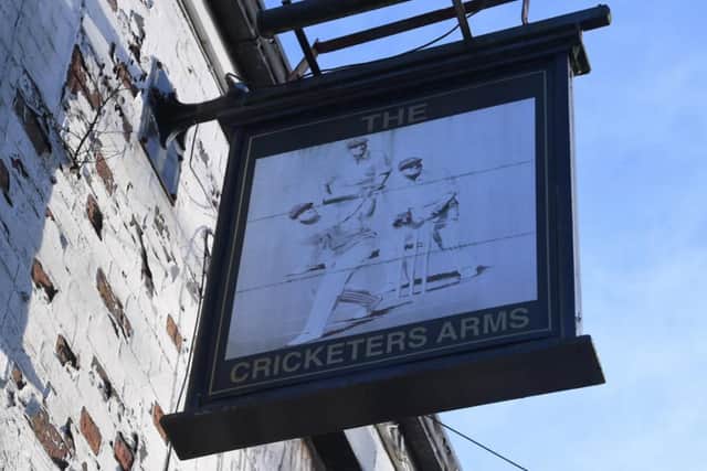 Twelve years since a pint was pulled the Cricketers pub sign still greets passers-by.