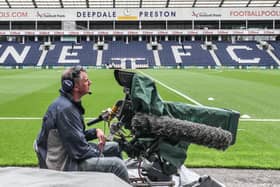 A television by the side of the pitch at Deepdale