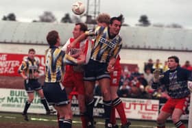 David Moyes watches as Mike Conroy challenges in the air during Preston North End's FA Cup defeat to Kidderminster in January 1994