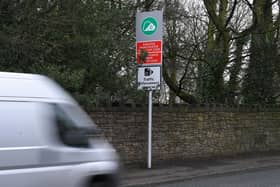 Signs warning of the new Greater Manchester Clean Air Zone have sprung up on the border of Chorley and Bolton, as seen here on Chorley Road (image: Neil Cross)