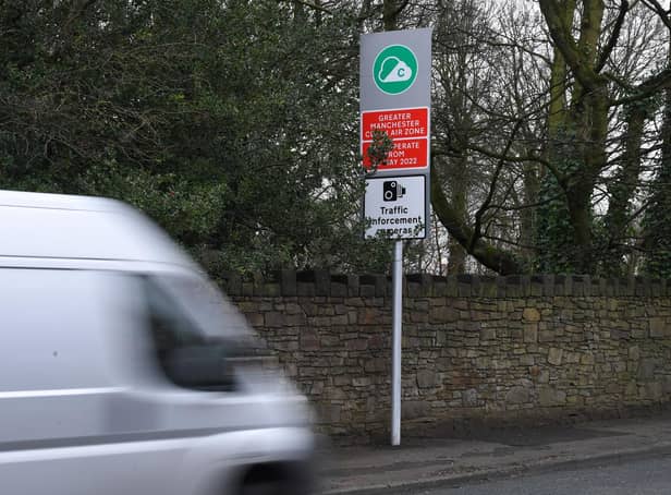 Signs warning of the new Greater Manchester Clean Air Zone have sprung up on the border of Chorley and Bolton, as seen here on Chorley Road (image: Neil Cross)