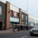 Mourners pay their respects as Mr Pike's funeral passes Turf Moor in recognition of his loyalty to the Clarets