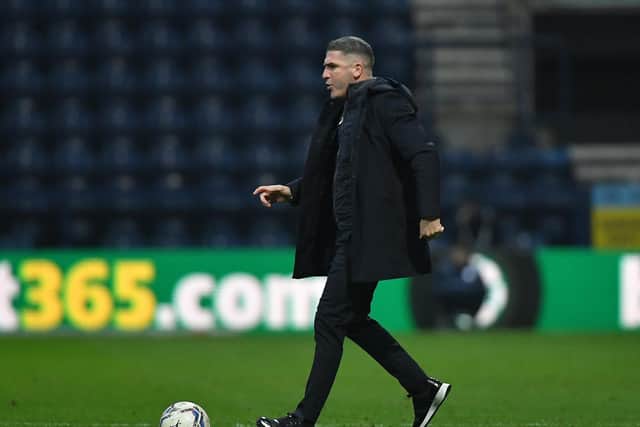 Preston North End manager Ryan Lowe returns the ball on to the pitch during the 1-1 draw with Birmingham at Deepdale