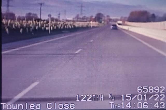 The officers shared a picture of the pursuit and the speedometer which clocked the driver hitting the 'crazy speed' of 122mph on the 50mph road - more than 70 mph over the speed limit