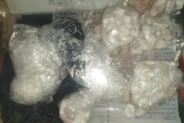 Police arrested a man in Preston last night after they found a 'large quantity' of Class A drugs (pictured) stashed in his clothes and bag, as well as cash, during a stop and search in the Frenchwood area of the city