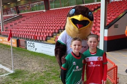 Best friends forever Hughie and Freddie pictured with Walsall mascot Swifty