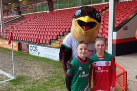 Best friends forever Hughie and Freddie pictured with Walsall mascot Swifty