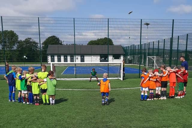 A nail-biting moment at Roefield Leisure Centre as children contest a penalty shootout.