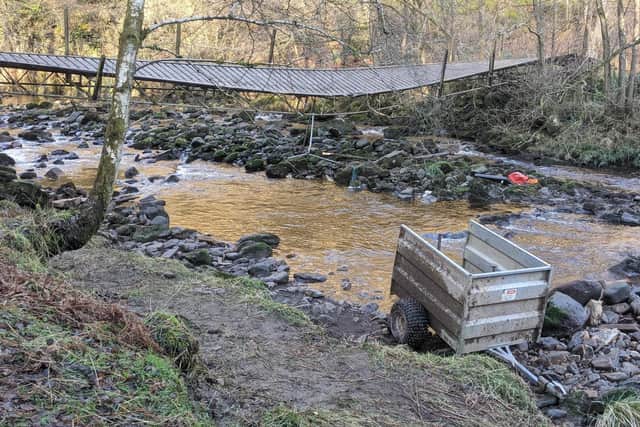 The first pictures have emerged showing what is believed to be the collapsed bridge in Roeburndale, Lancashire, where one man was killed and others were seriously injured. Photo: Kelvin Stuttard