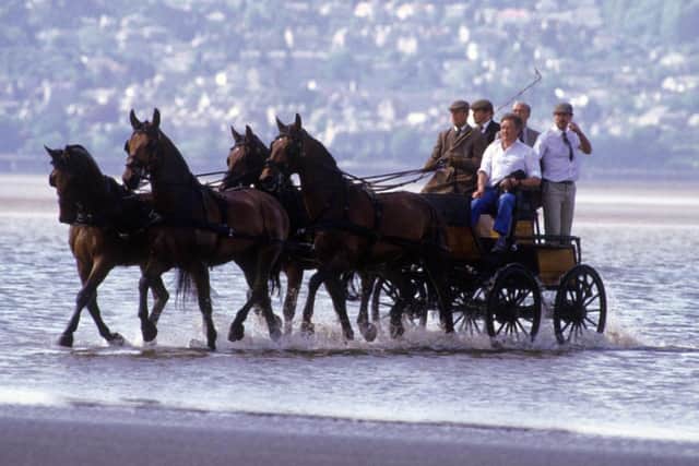 Duke of Edinburgh competes in the Holker Hall Carriage Driving Trials across Morecambe Bay on May 30, 1985.