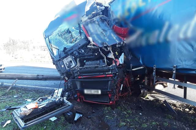 The crash involved a car, a lorry and a HGV crane, resulting in a significant spillage of diesel and hydraulic (Credit: National Highways)