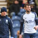 Preston North End's Tom Barkhuizen comes off with physio Matt Jackson after being injured against Fulham in November