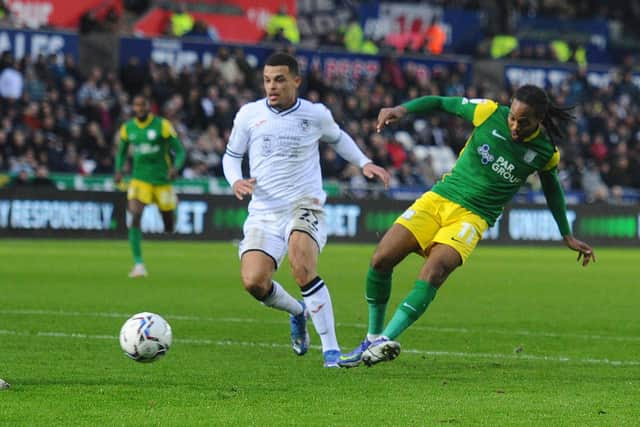 Preston North End midfielder Daniel Johnson has a shot against Swansea in the second half.