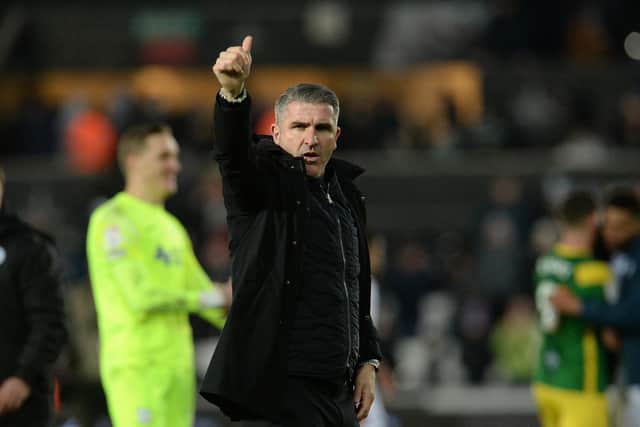 Preston North End manager salutes the travelling PNE fans at the final whistle