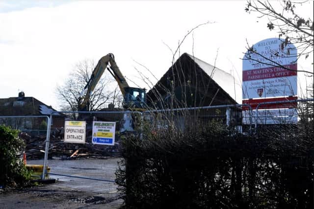 Demolition of the old chapel and parish hall in February last year.