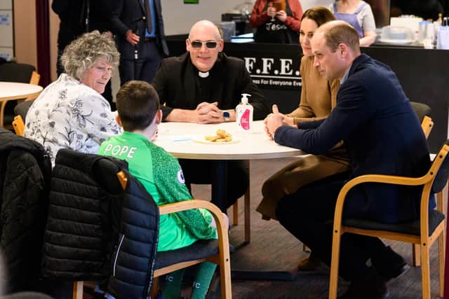 The Royal couple with Pastor Mick Fleming and Deacon Glover (11) and his great grandma Carole Ellis