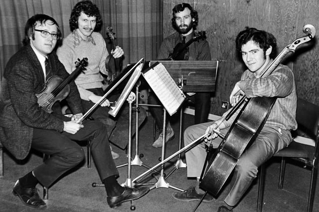 2nd November 1972

The Fitzwillam Quartet - left to right, Nicholas Dowding (23), John Phillips (22), Alan George (22) and Ioan Davies (23) who have pulled off a musical coup by arranging to give the British premiere next Saturday of Shostakovich's 13th, and latest, string quartet.

Work will be performed at St. Mark's Church, Harrogate.
