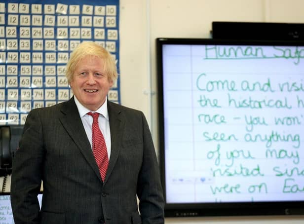 Prime Minister Boris Johnson joining a socially distanced lesson during a visit to Bovingdon Primary School in Hertfordshire on June 19, 2020. Boris Johnson was facing fresh allegations of breaking coronavirus rules after it emerged a gathering to wish him a happy birthday was held inside No 10 during the first lockdown
