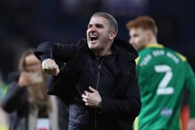 Ryan Lowe celebrates with the Preston North End fans after the victory over West Bromwich Albion at The Hawthorns