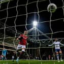 Callum Robinson watches a chip from Preston North End team-mate Alan Browne hit the back of the net against Bristol City at Deepdale in March 2018