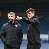 Morecambe's management team of Stephen Robinson and Diarmuid O'Carroll hope Cole Stockton will stay put Picture: Jack Taylor