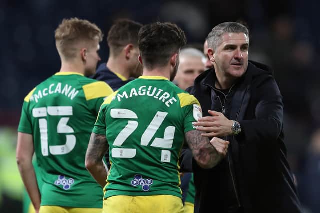 Preston North End striker Sean Maguire with Ryan Lowe at the final whistle of the victory at West Bromwich Albion