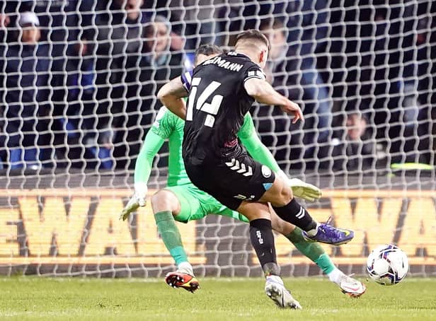 Bristol City’s Andreas Weimann scores at Luton on Tuesday night