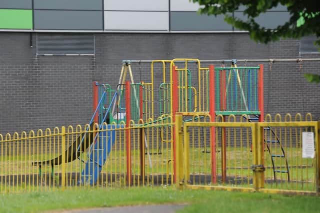 A children's playground is only yards away from the derelict building.
