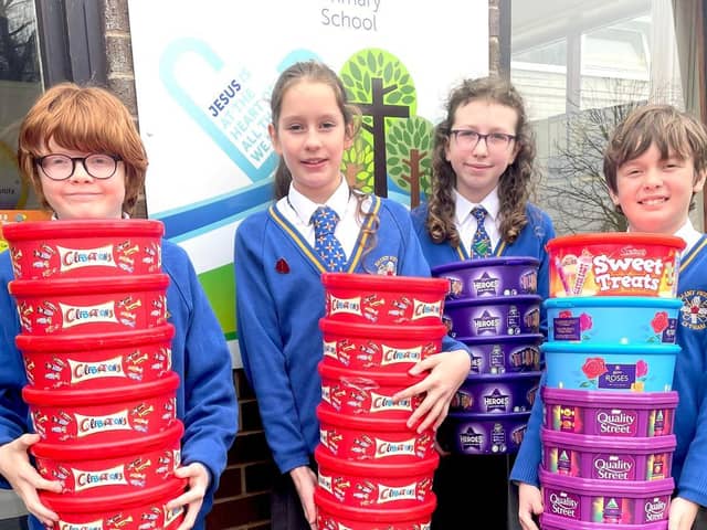John, Lydia, Ffion and Oliver from St Peters Catholic Primary School in Lytham, with the plastic tubs collected for the Tub2Pub recycling scheme