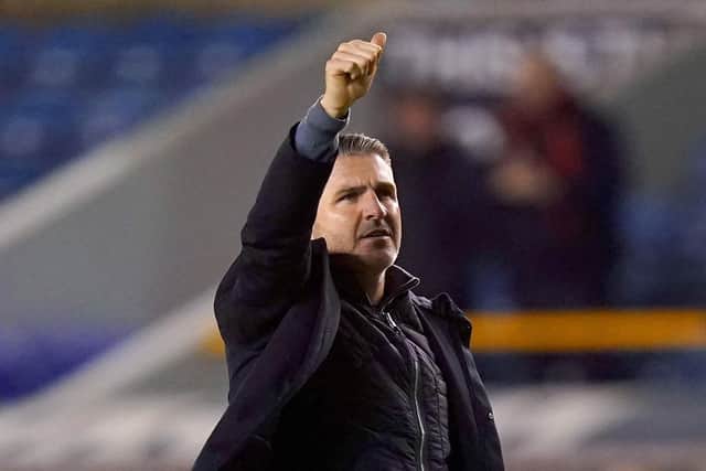 Preston North End manager Ryan Lowe salutes the travelling fans after the final whistle at Millwall