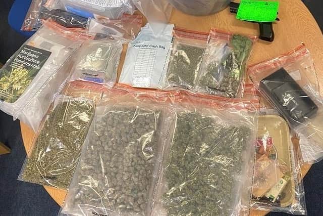 Three men were arrested after drugs, cash, BB guns and shotguns were seized in Mere Brow, Lancashire (Credit: Lancashire Police)