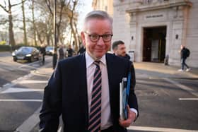 Minister for Levelling Up Michael Gove leaves a media studio following an interview on February 2 in London. Photo by Leon Neal/Getty Images