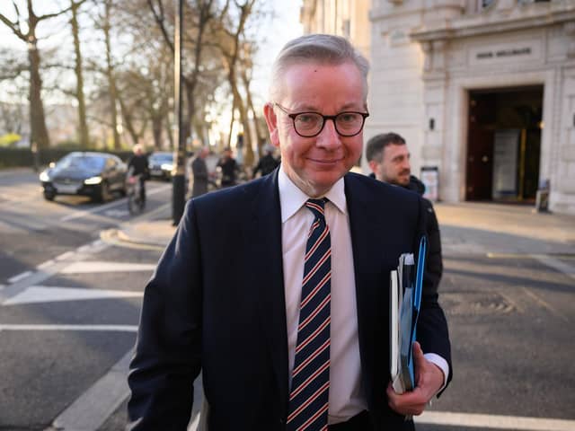 Minister for Levelling Up Michael Gove leaves a media studio following an interview on February 2 in London. Photo by Leon Neal/Getty Images