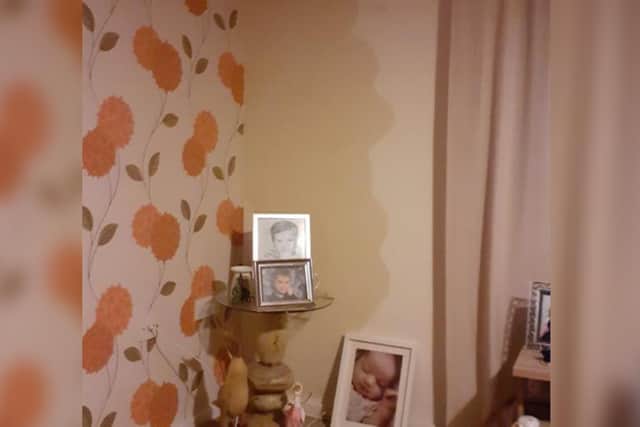 Water damage to her neighbour's walls.