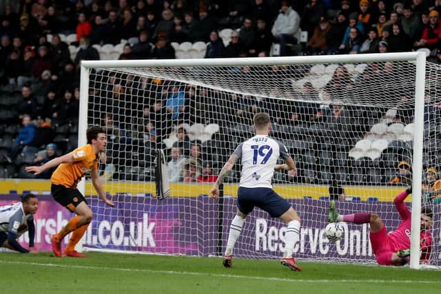 Hull goalkeeper Matt Ingram saves from PNE striker Emil Riis in the first half at the MKM Stadium