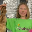 Jennifer cut more than 12 inches off her hair for Derian House Children's Hospice.