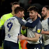 Preston North End defender Andrew Hughes celebrates the win at Hull with Ched Evans, Daniel Iversen and Greg Cunningham