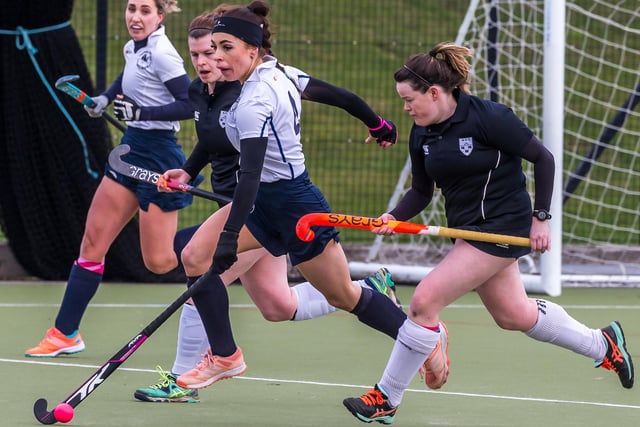 Millie Storr on the charge (centre)