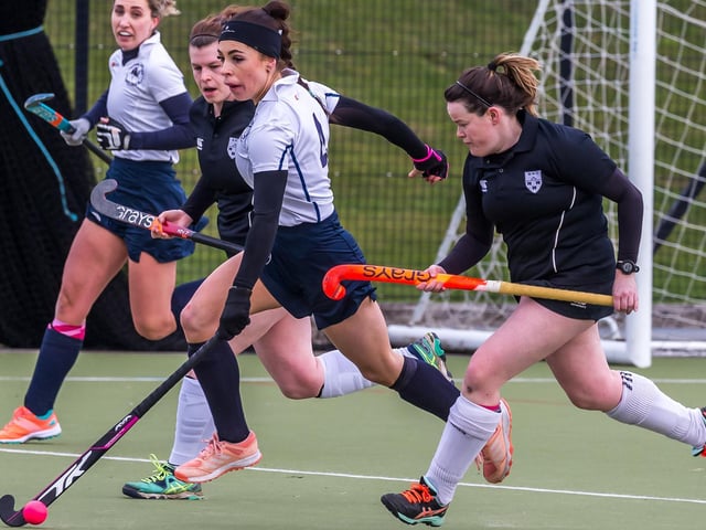 Millie Storr on the charge (centre)