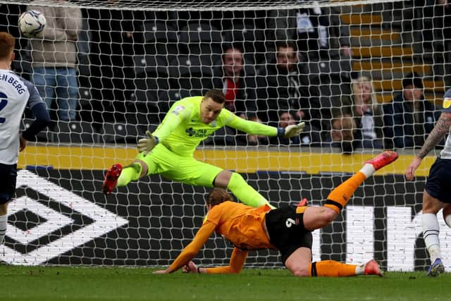 Preston North End goalkeeper Daniel Iversen makes a stunning save from Hull City's Tom Eaves at the MKM Stadium