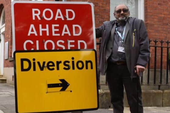 Coun Yousuf Motala says the latest roadworks are causing delays that could be relieved by County Hall.
