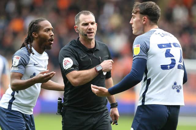 Tim Robinson in the middle for PNE's game with Blackpool.