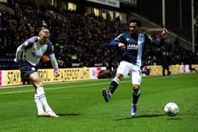 Preston North End’s Brad Potts – who had a passing accuracy of 82.7% from 52 passes – crosses under pressure from Huddersfield Town’s Duane Holmes on Wednesday nigh