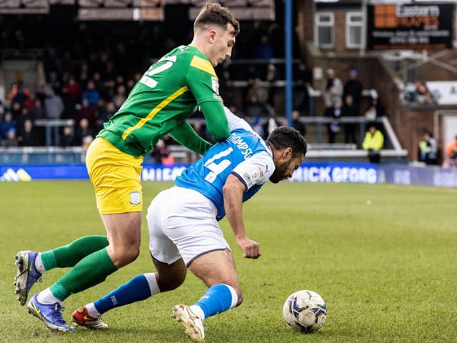 North End’s Josh Earl battling with Peterborough United’s Nathan Thompson