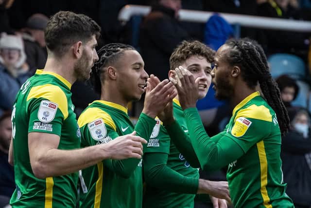 Preston North End striker Cameron Archer celebrates with Ched Evans, Daniel Johnson and Ryan Ledson after scoring against Peterborough United