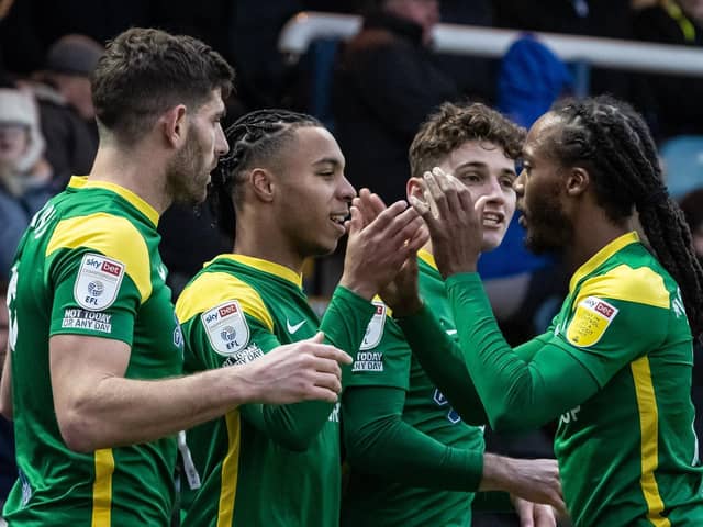 Preston North End striker Cameron Archer celebrates with Ched Evans, Daniel Johnson and Ryan Ledson after scoring against Peterborough United