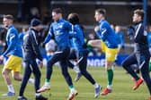 PNE players warming-up before the game against Peterborough United at London Road