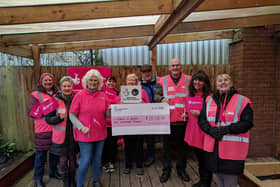 Chorley in Bloom members with the cheque donation which will be used to develop a community and learning hub.